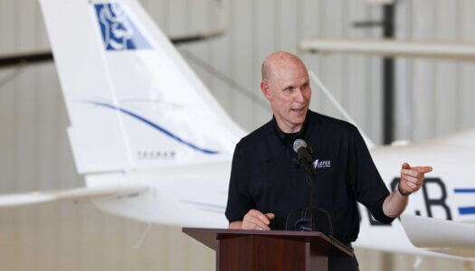 Chancellor Neal Schnoor speaks during the Loper Flight Academy ribbon-cutting ceremony.