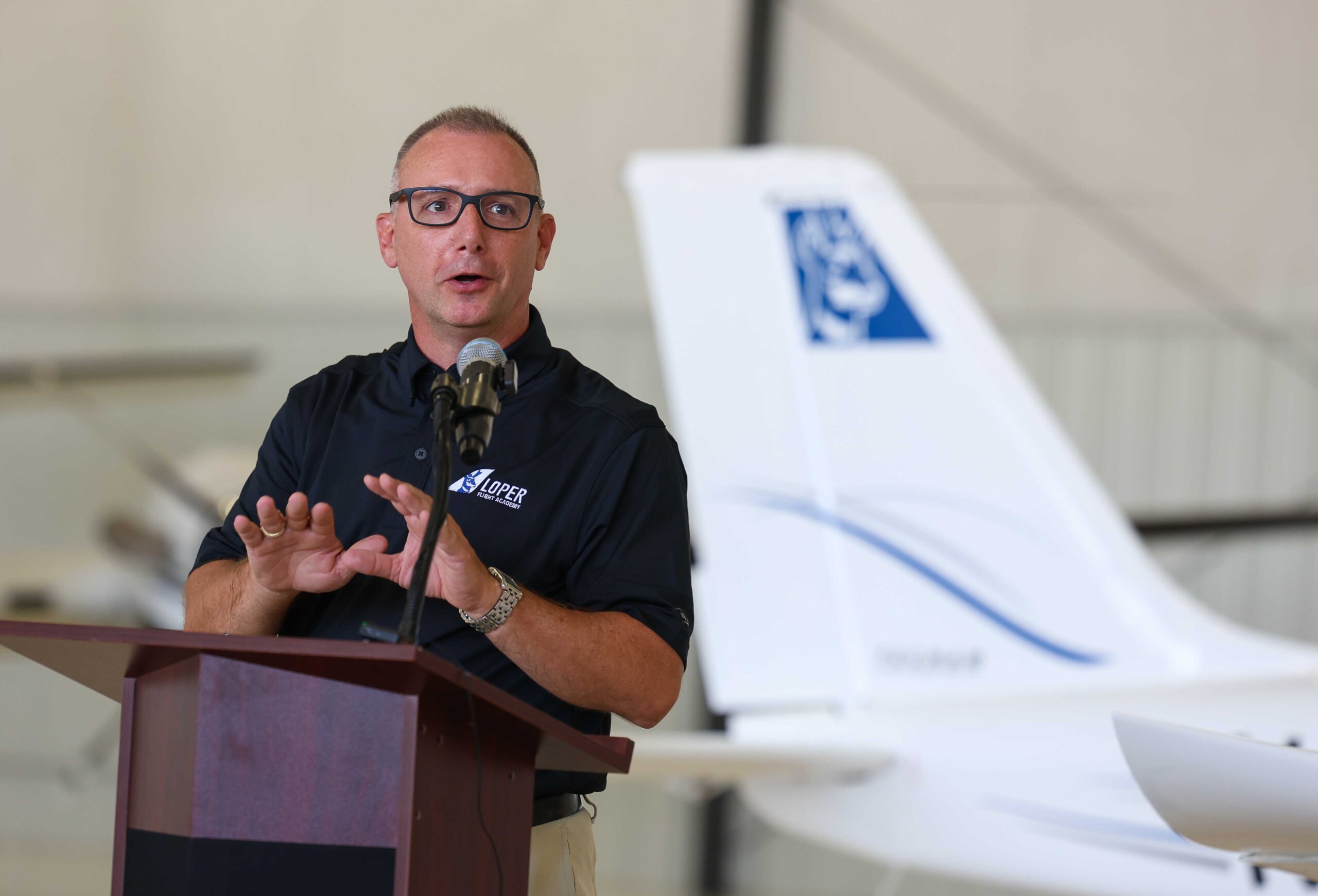 Dan Smith speaks during the Loper Flight Academy ribbon-cutting ceremony.