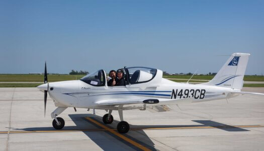 UNK Chancellor Neal Schnoor and assistant chief flight instructor Masahiro Suzuki land one of the Tecnam planes at Kearney Regional Airport during Thursday's ribbon-cutting ceremony celebrating the new Loper Flight Academy.
