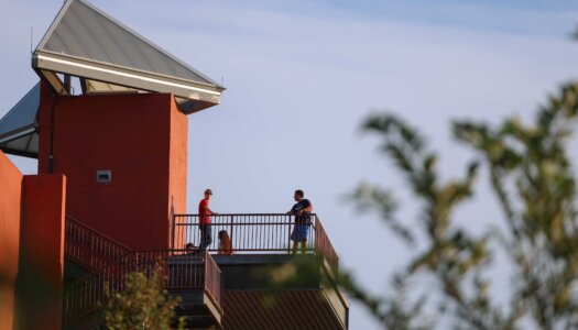 UNK students on the Yanney Park tower.