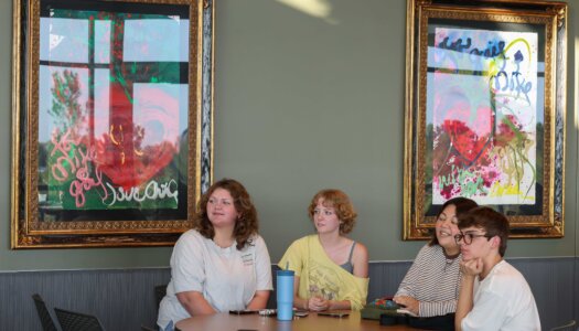 UNK students listen to karaoke during the Loper Lot Party.