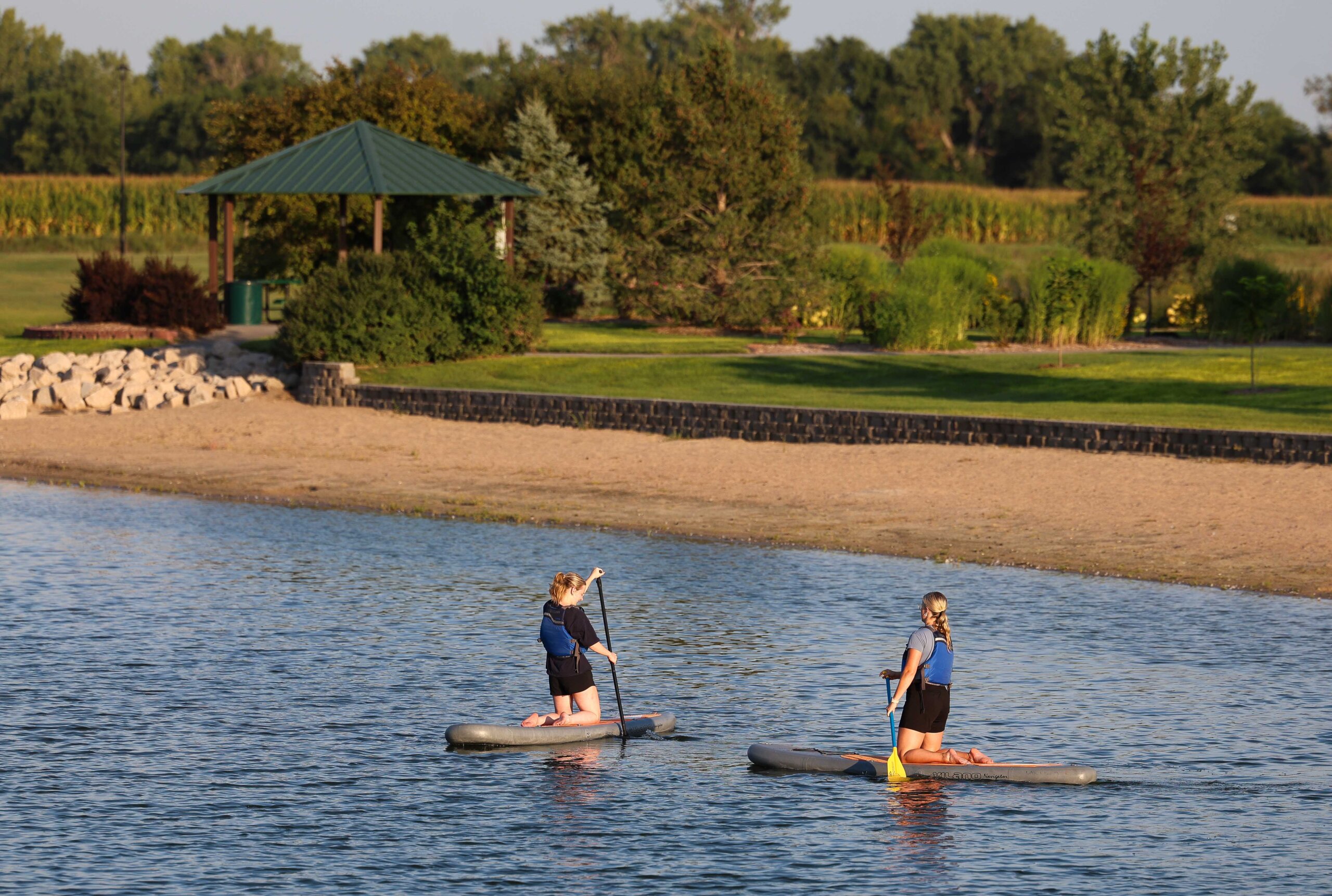 UNK students paddleboard at Yanney Park.