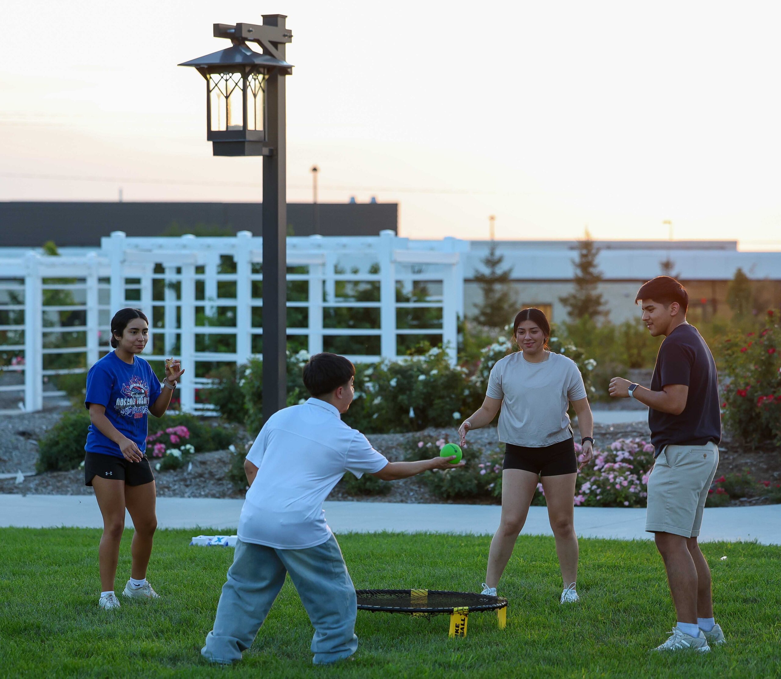 UNK students play Spikeball during the Loper Lot Party.