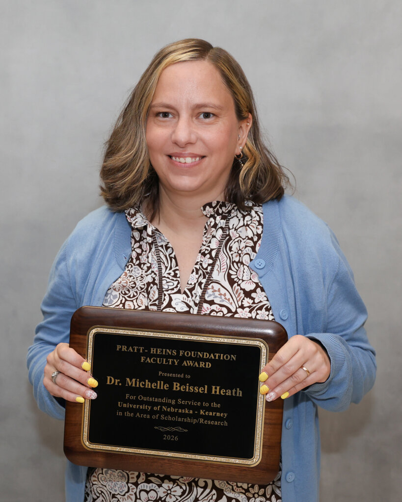 Michelle Beissel Heath is pictured with her award