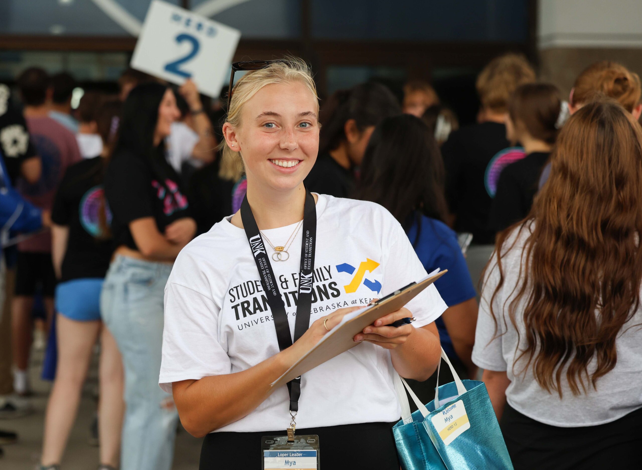A student volunteer poses for a photo during the Parade of Lopers.