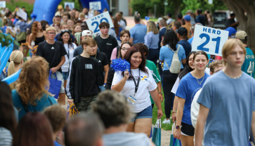 Students walk in the Parade of Lopers.