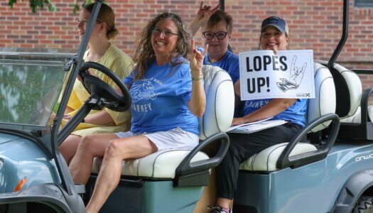 The UNK Admissions Team leads the Parade of Lopers.