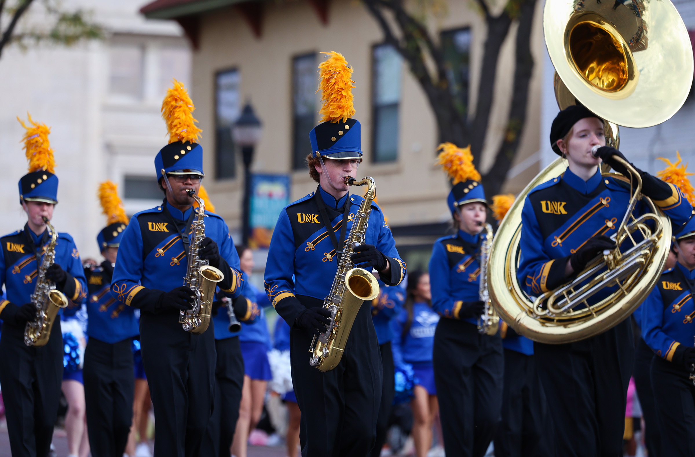 The Pride of the Plains Marching Band performs during the UNK Homecoming Parade.