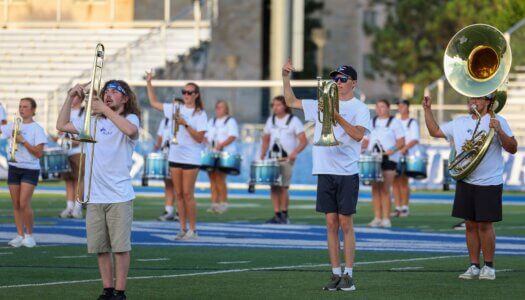 The Pride of the Plains Marching Band performs during Blue Gold Showcase.