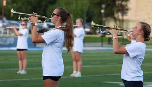 The Pride of the Plains Marching Band performs during Blue Gold Showcase.