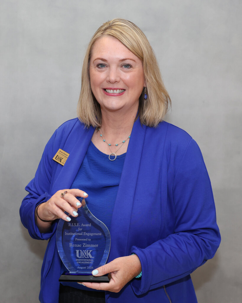 Renae Zimmer is pictured with her award