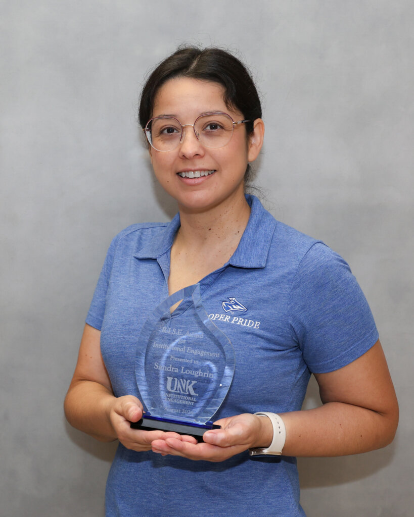 Sandra Loughrin is pictured with her award