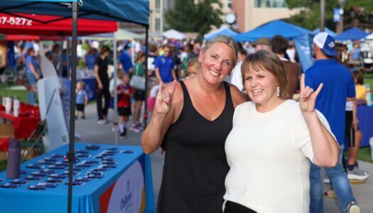 Amy Nebesniak and friend throw their lopes at Blue Gold Showcase.