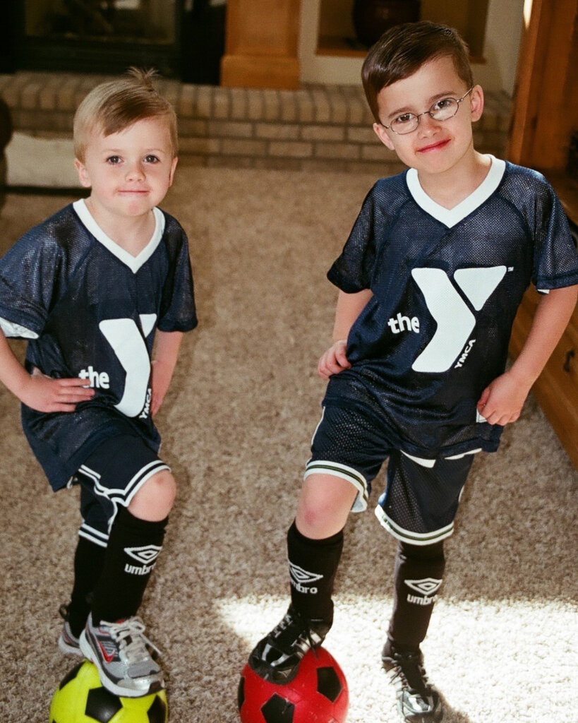 Shay and Trey Prichard as young soccer players in the YMCA uniforms.
