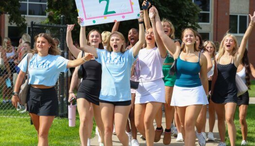 Potential New Members storm the field.