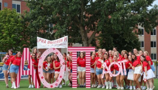Alphao Omicron Pi members pose for the camera.