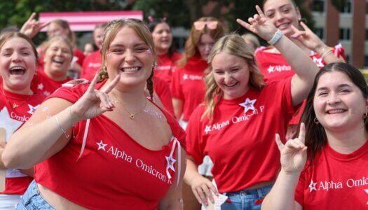 Alphao Omicron Pi members pose for the camera.