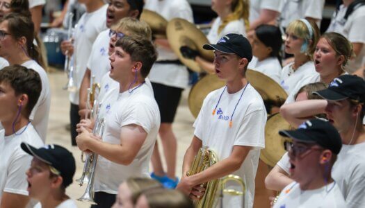 The Pride of the Plains Marching Band performs at convocation.