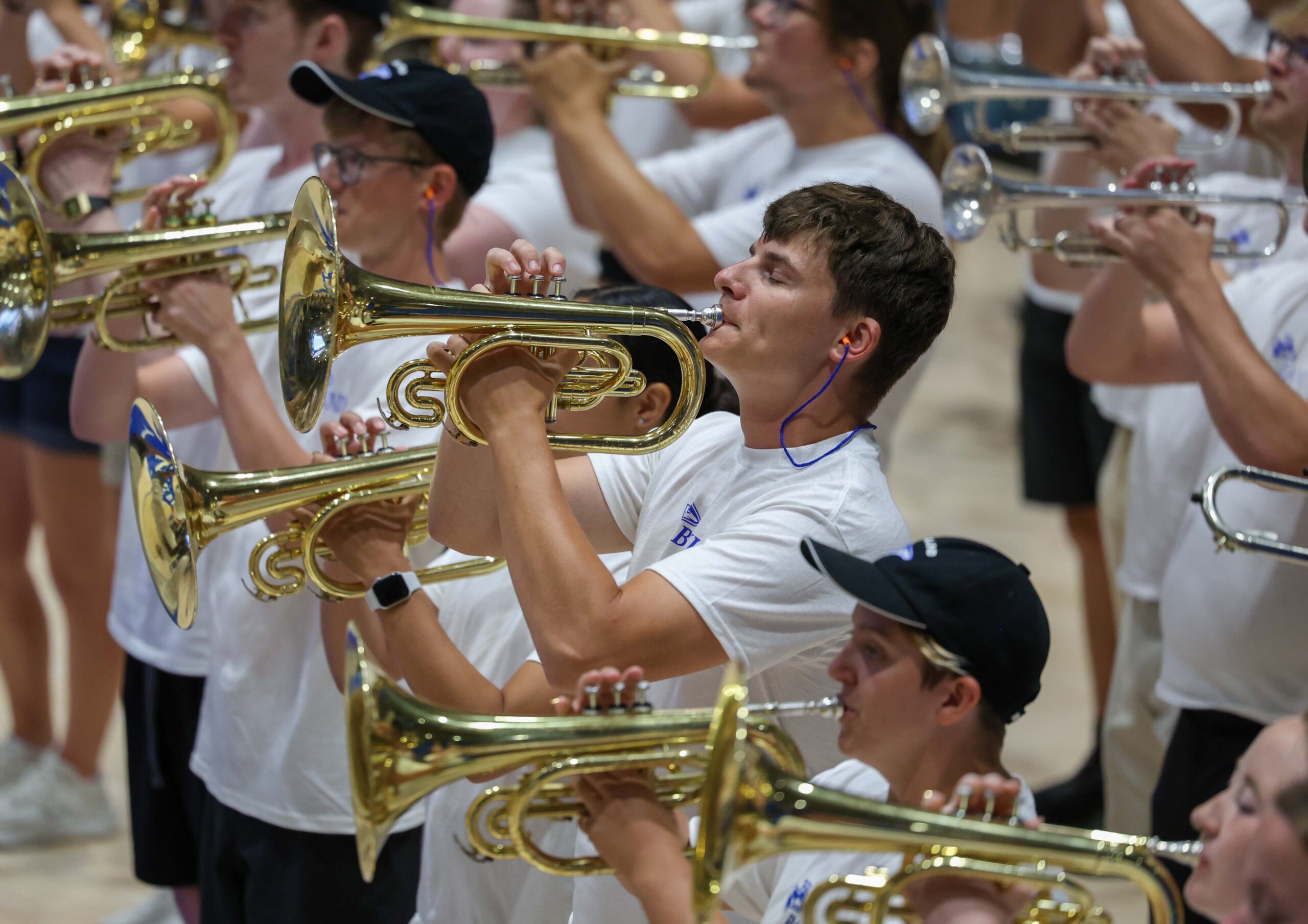 Students playing brass instruments.