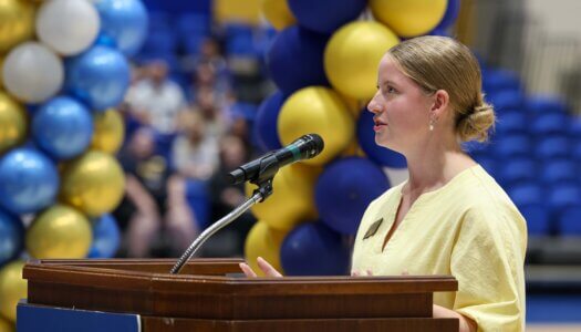 UNK Student Body President Paige Oltmans speaks at convocation.