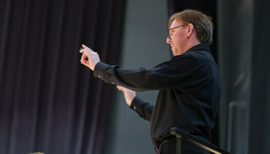 Brian Alber directs the Symphonic Band.