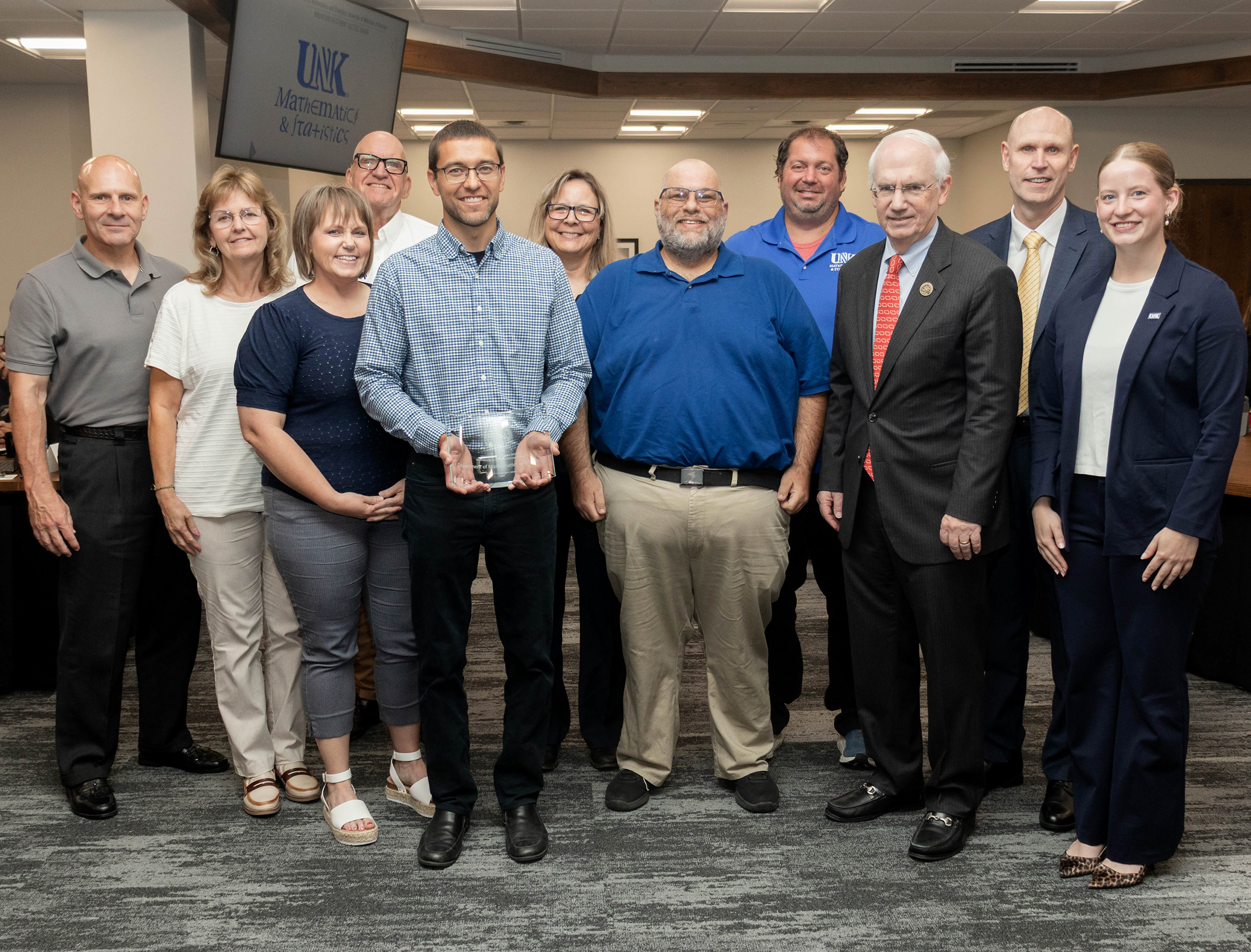 Faculty from the UNK Department of Mathematics and Statistics are recognized with a President's Excellence Award during last week's NU Board of Regents meeting.