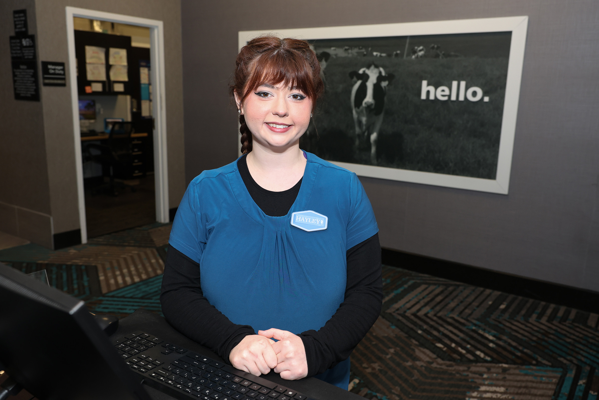 Hayley Dickey poses for a photo inside the Hampton Inn in Kearney.