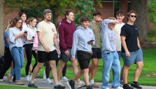 UNK students arrive for the homecoming pep rally.