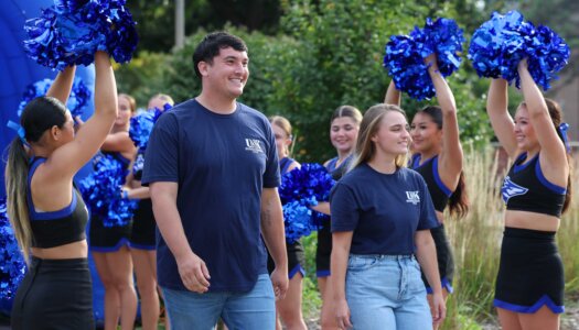 UNK homecoming royalty candidates are introduced during a pep rally on campus.