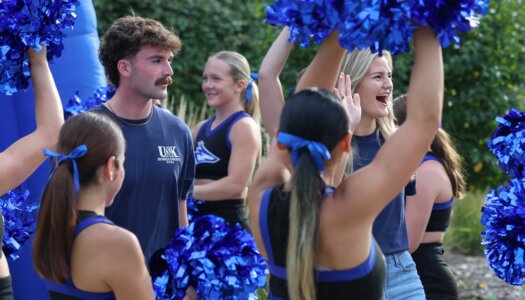 UNK homecoming royalty candidates are introduced during a pep rally on campus.