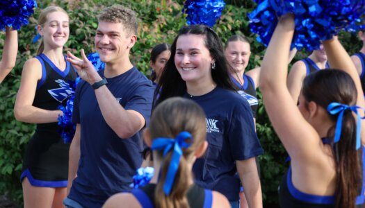 UNK homecoming royalty candidates are introduced during a pep rally on campus.