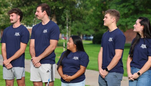 UNK homecoming royalty candidates are introduced during a pep rally on campus.