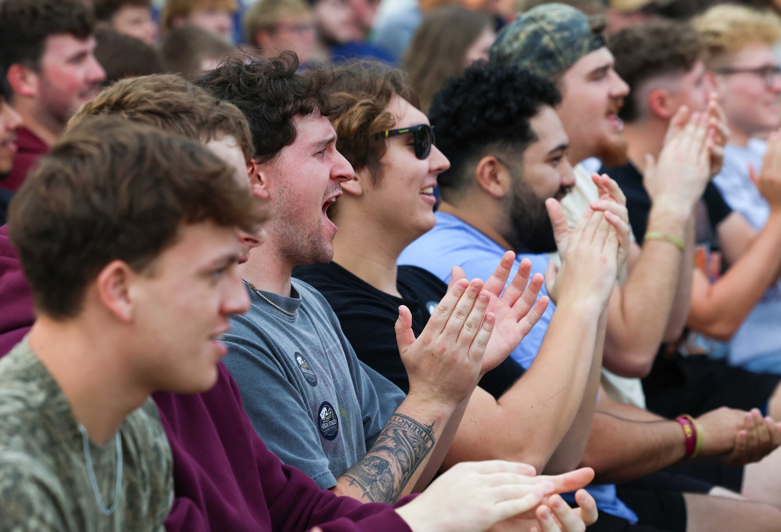 UNK students cheer during a homecoming pep rally.
