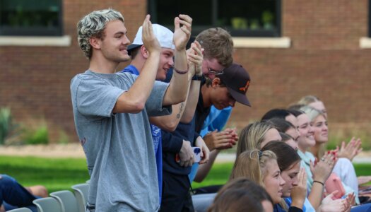 UNK students cheer during a homecoming pep rally.