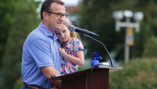 UNK Athletic Director Marc Bauer speaks during the homecoming pep rally.