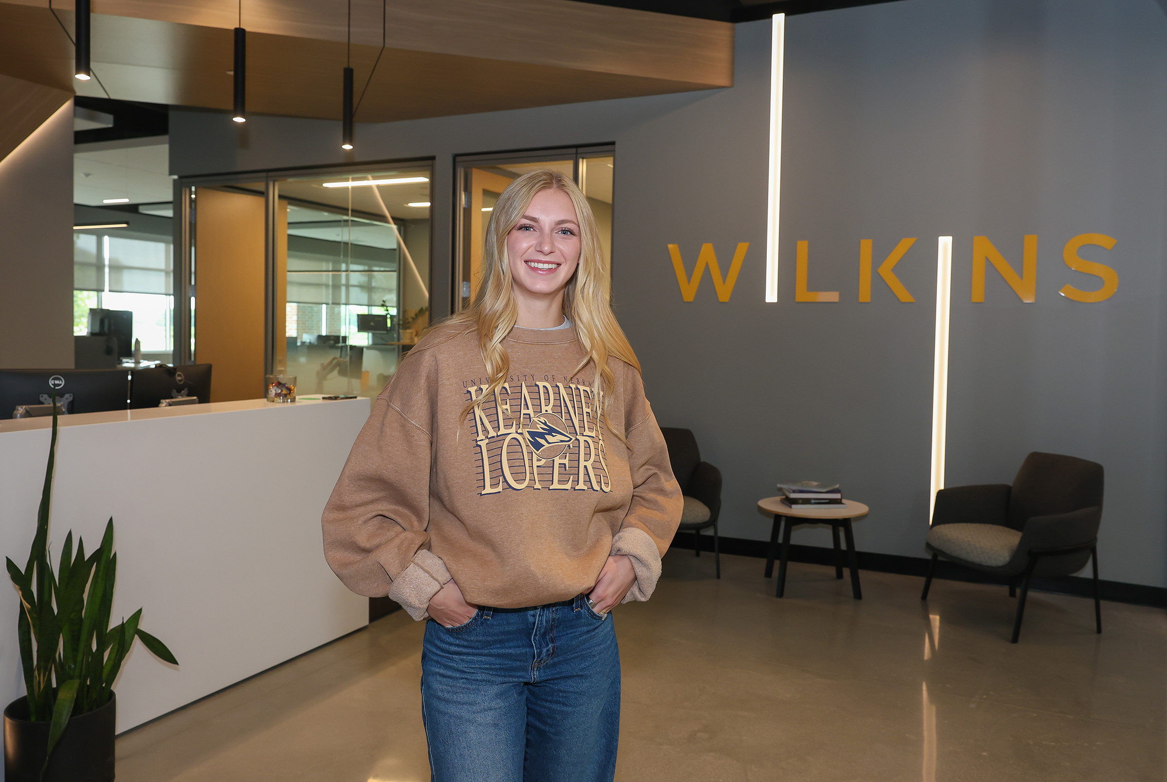 Joee Lempke poses for a photo at Wilkins ADP in Kearney.