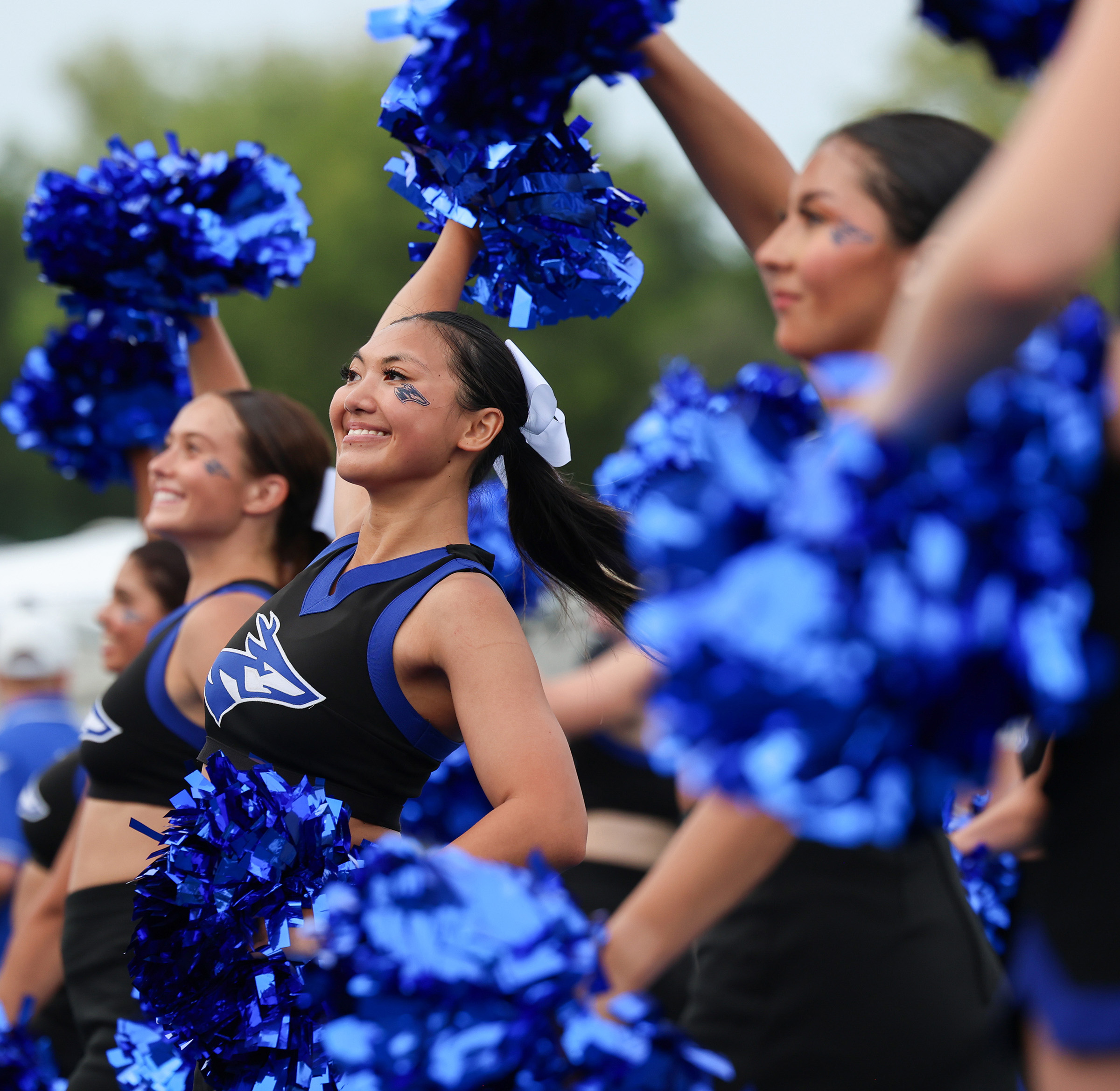 Nikki Sonthana cheers during a UNK football game.