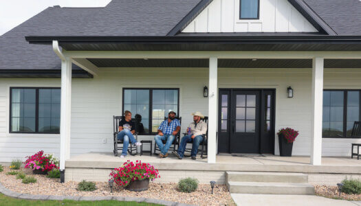 Ryan Arbuthnot sits on the front porch with his parents.