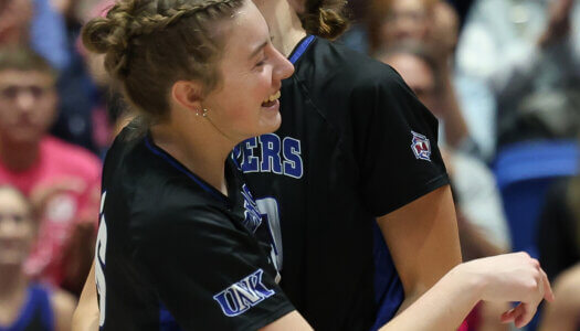 Sydney Davis celebrates with teammate Brynn Stowell.