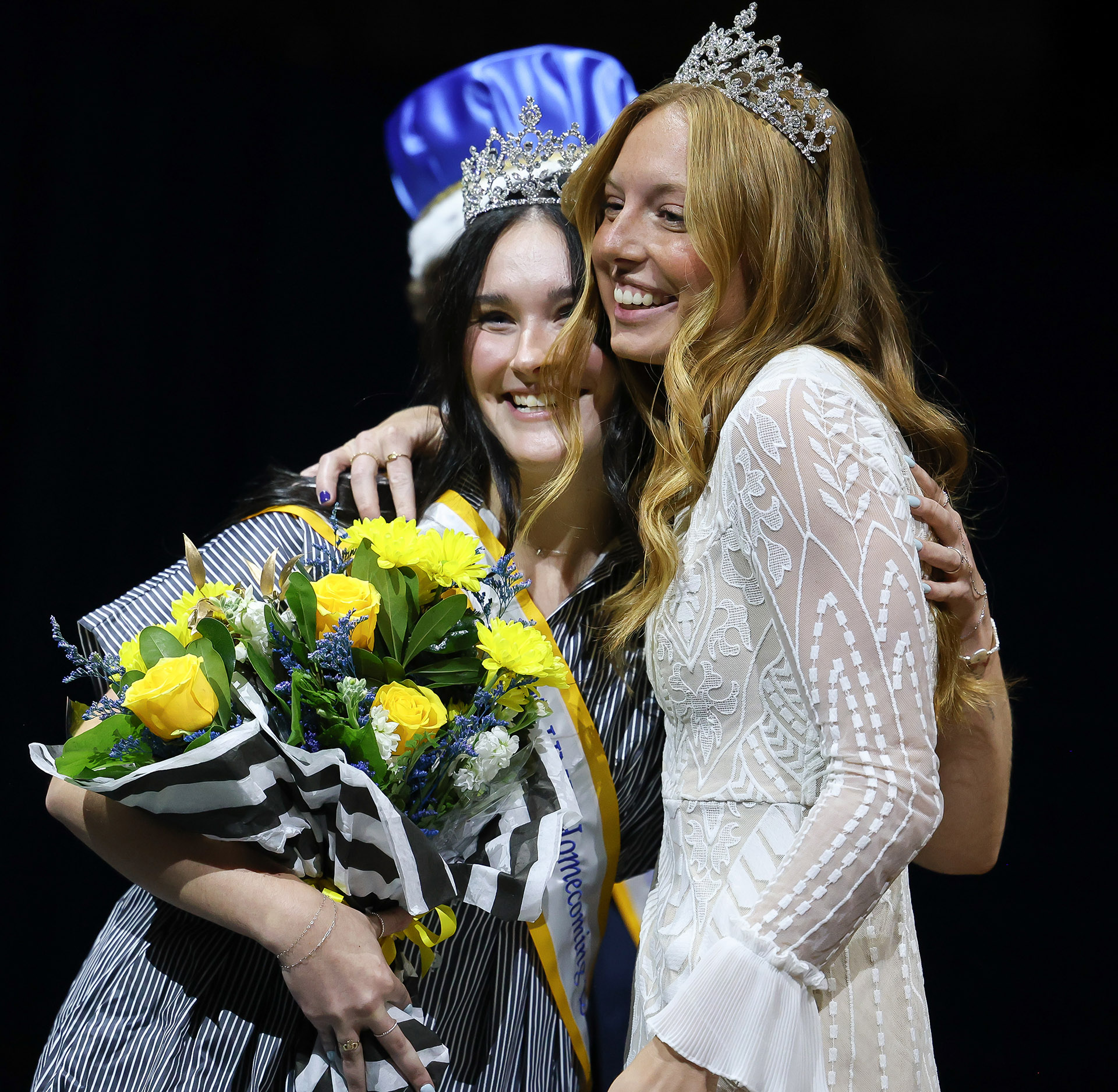 Addison Chapman hugs Jenna Rauert