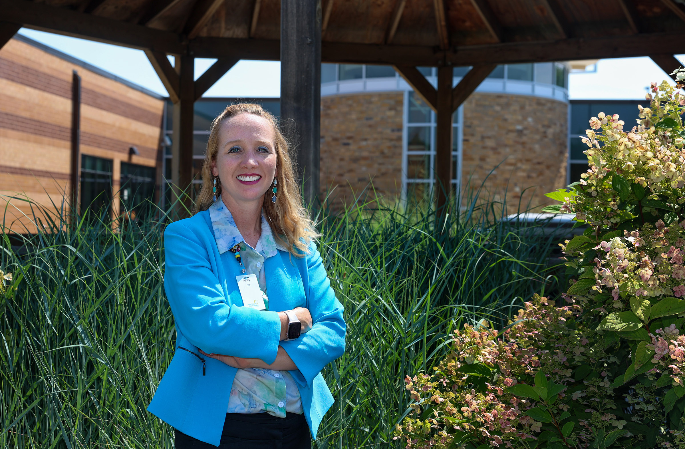 Ashley Woodward poses for a photo outside the Valley County Health System hospital