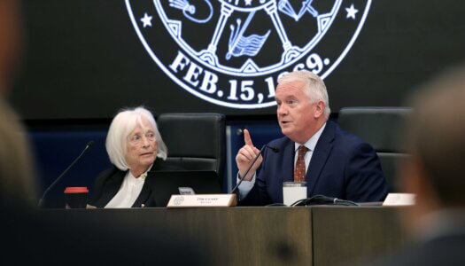 Regent Tim Clare speaks during Friday's meeting.