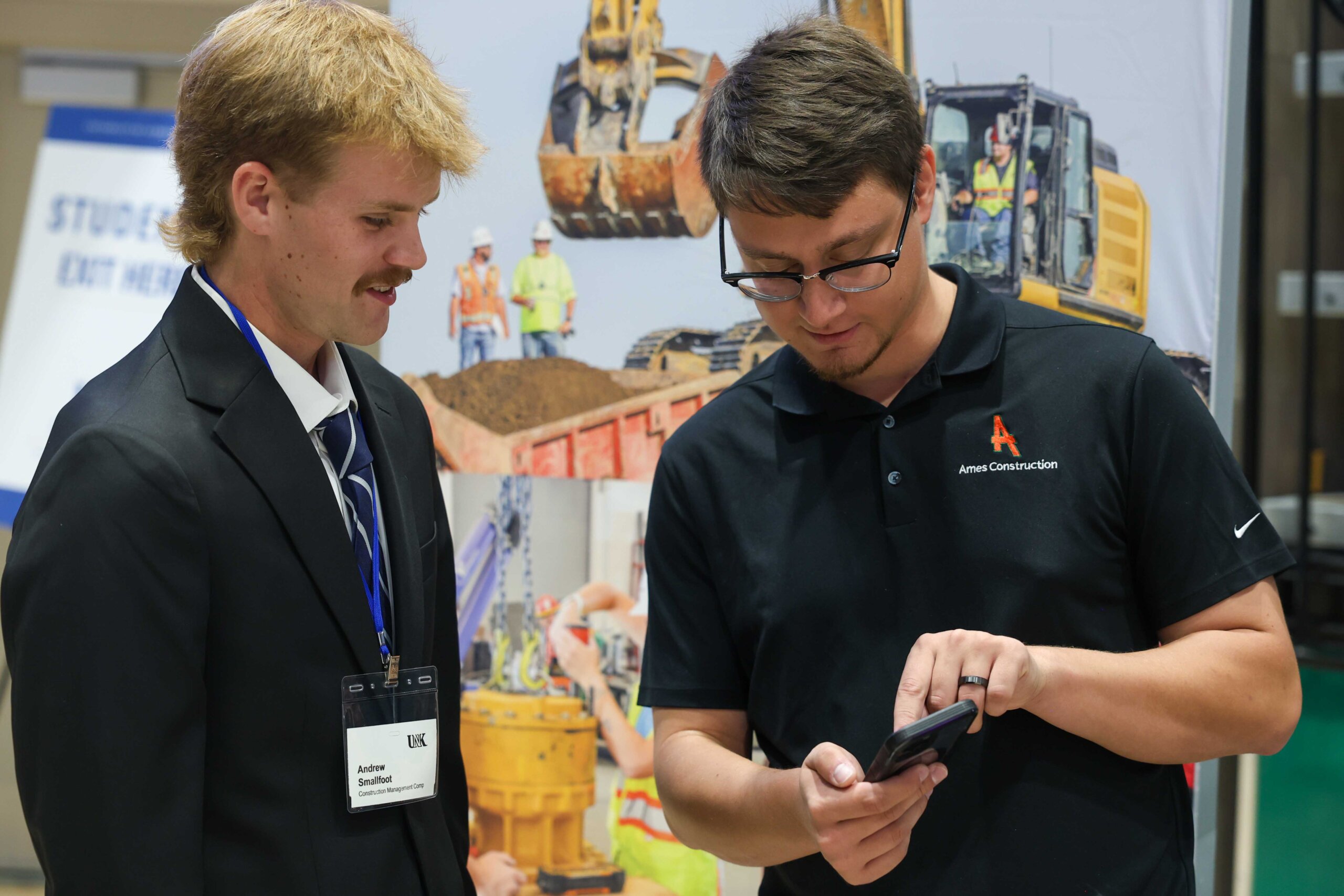 Cade Nicol meets with UNK student Andrew Smallfoot during Thursday’s Career and Internship Fair.