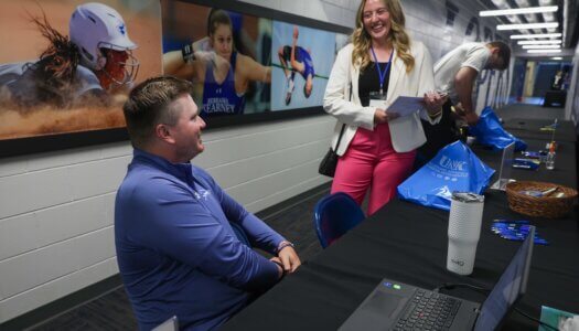 Shawn Rodehorst talks to a UNK student during the Career and Internship Fair.