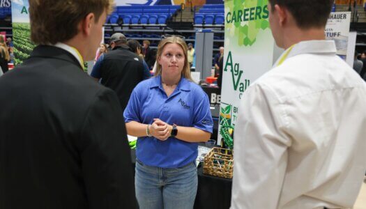 UNK students meet with an employer during the Career and Internship Fair.