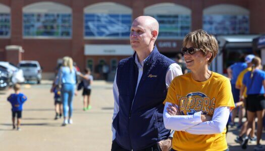 Chancellor Neal Schnoor and his wife Teresa enjoy the tailgate.