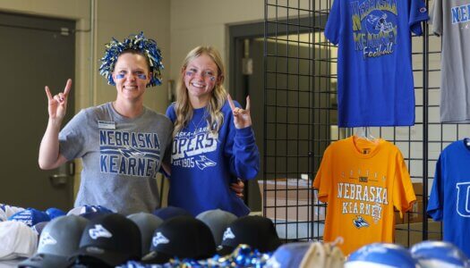 The Loper Spirit Shop employees throw their Lopes.
