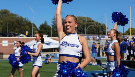 The Sapphires Dance Team cheers on the Lopers from the sidelines.
