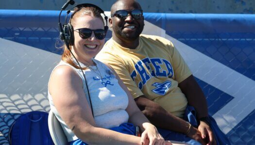 UNK Cheer coach Randi Todd poses.