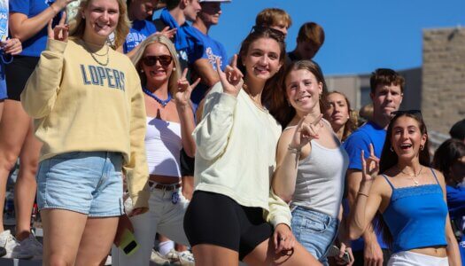 UNK volleyball throws their Lopes.